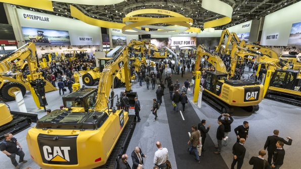 An overview of a portion of Caterpillar39s massive indoor stand which took up an entire building that was once an airplane hangar Combined Caterpillar and Zeppelin Cat its German dealership took up more than 12000 square meters at Bauma