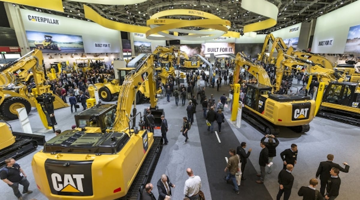 An overview of a portion of Caterpillar&apos;s massive indoor stand, which took up an entire building that was once an airplane hangar. Combined Caterpillar and Zeppelin Cat, its German dealership, took up more than 12,000 square meters at Bauma.
