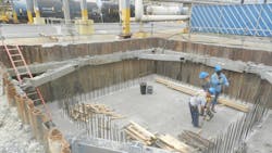 Workers in a trench with NTS safety equipment Workers in a trench with NTS safety equipment