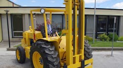 Walter Sellick and his first rough-terrain forklift.