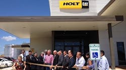 Holt Cat officials prepare for ribbon cutting at its Edinburg, Texas, dealership facility.
