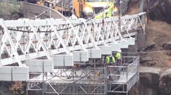 Bridge repair will be an important part of Safway&apos;s Infrastructure Services Group. Above crews work on a suspended platform created by Spider, which Safway acquired last year.