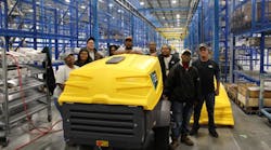 Atlas Copco&apos;s Rock Hill crew with the first air compressor produced at the new plant.