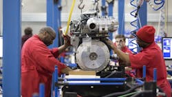 US factory workers on the job in Pendergrass Ga US factory workers on the job in Pendergrass Ga