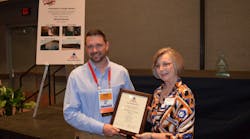 Nickell Rental&rsquo;s Hiram branch manager Jason Pierce accepts the President&apos;s Image Award from ARA Region Three Director Peggy DeFrancisco at The Rental Show in Orlando, Fla.