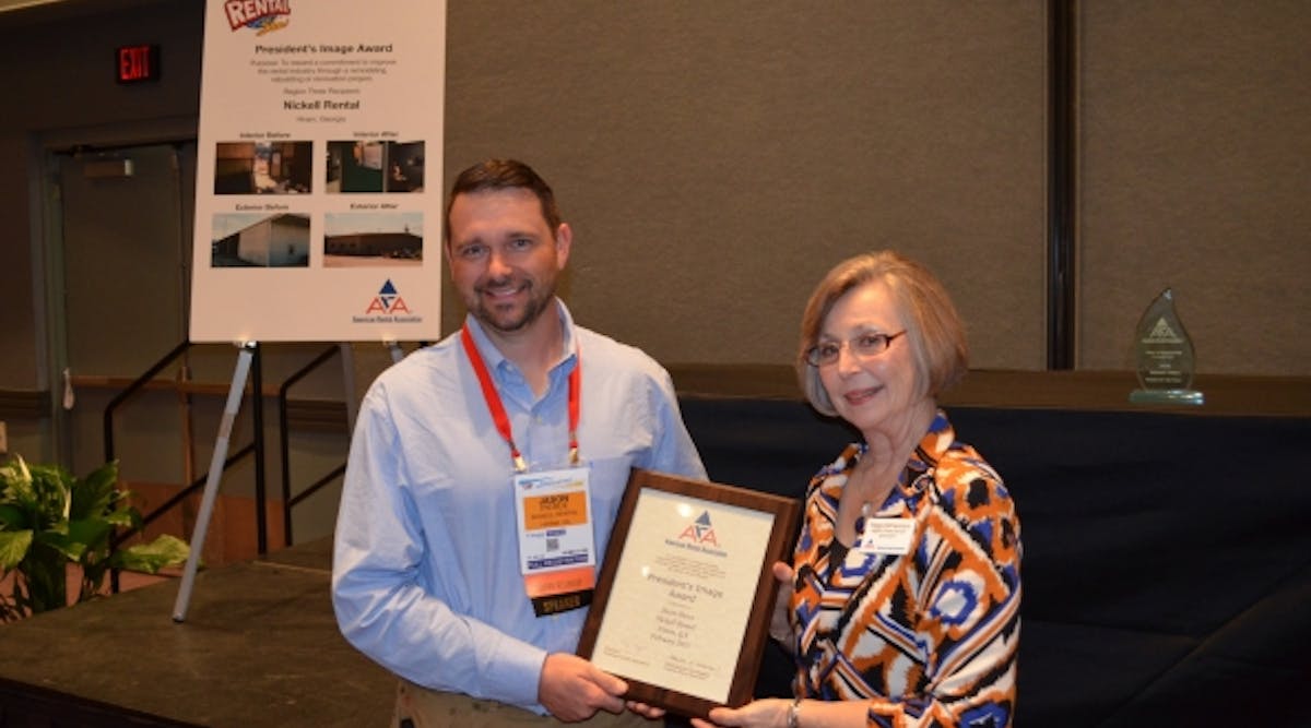 Nickell Rental&rsquo;s Hiram branch manager Jason Pierce accepts the President&apos;s Image Award from ARA Region Three Director Peggy DeFrancisco at The Rental Show in Orlando, Fla.