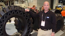 Michael Dembe, Camso&rsquo;s product management executive director, North America and Latin America - Construction, shows Camso&apos;s tires at ConExpo last month.