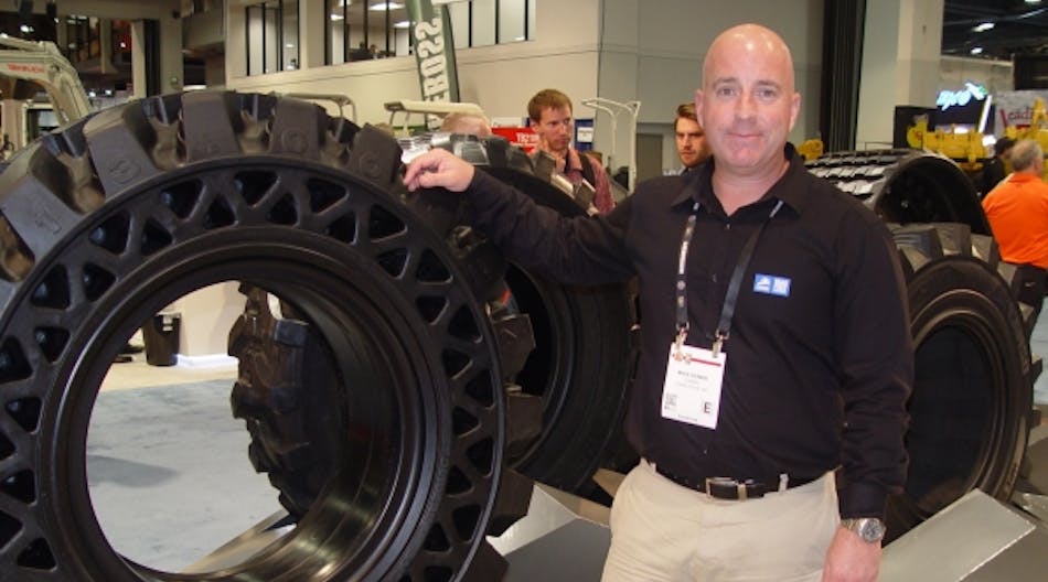 Michael Dembe, Camso&rsquo;s product management executive director, North America and Latin America - Construction, shows Camso&apos;s tires at ConExpo last month.