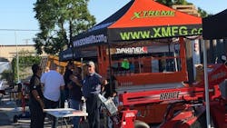 Jim Grasse of Broce Brooms talks about equipment with a rental company visitor Broce Snorkel Makinex and others exhibited at the ARACRA chapter meeting at American Pneumatic Tools39 facility in Santa Ana Jim Grasse of Broce Brooms talks about equipment with a rental company visitor Broce Snorkel Makinex and others exhibited at the ARACRA chapter meeting at American Pneumatic Tools39 facility in Santa Ana