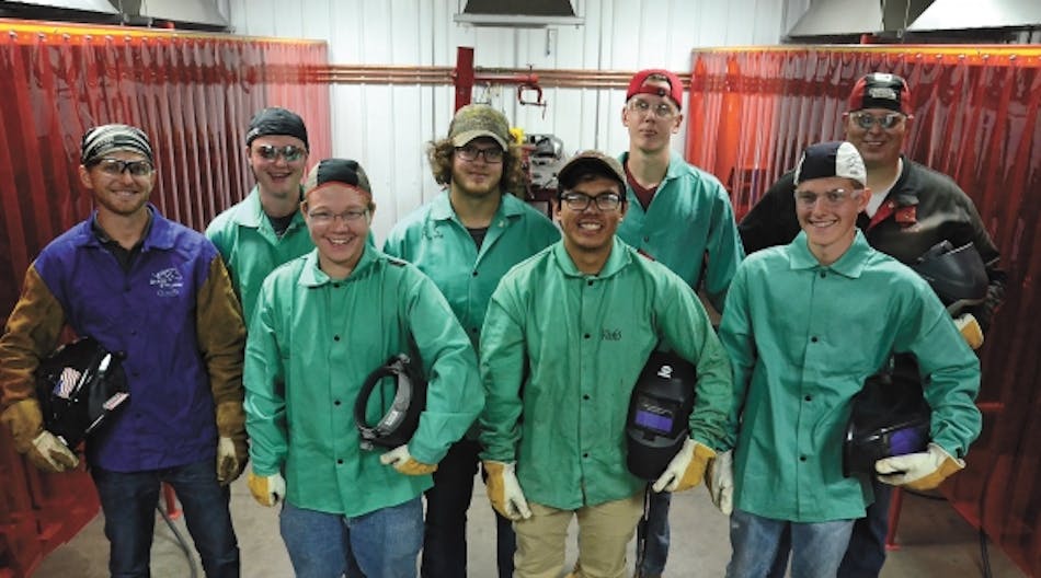 (Pictured left to right) Front Row: Instructor Jake Fisher, Kevin Burgess, Alvaro Brenes, Austin Middendorf; Back Row: Collin Olson, Austin Shoutz, Anthony Thorpe, and Instructor Ben Myhre.