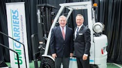 U.S. Senator Dick Durbin, at left, visits UniCarriers America in Marengo, Ill., in recognition of its role in creating jobs and manufacturing opportunities. At right is UniCarriers president James Radous III.
