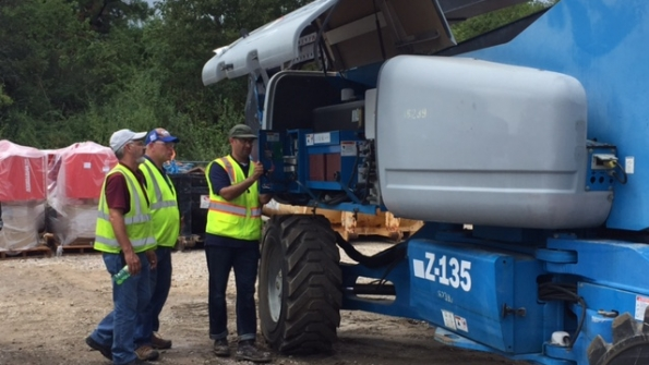 Terex AWP product support staff checking out a Genie boomlift at United Rentals39 Beaumont Texas branch