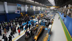 Visitors look around the new LiuGongDressta parts distribution center