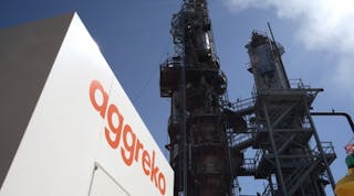 Aggreko, shown powering a refinery, is setting the pace for lowering its carbon footprint.