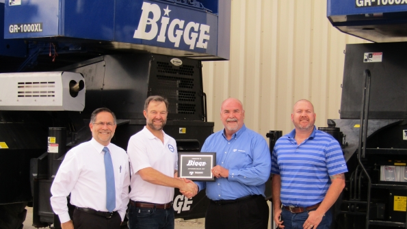 From left Ingo Schiller president and COO Tadano America Weston Settlemier president and CEO of Bigge Ron Dogotch senior vice president Tadano America and Brian Noga vice president Gulf Region Bigge celebrate the agreement