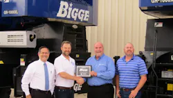 From left Ingo Schiller president and COO Tadano America Weston Settlemier president and CEO of Bigge Ron Dogotch senior vice president Tadano America and Brian Noga vice president Gulf Region Bigge celebrate the agreement
