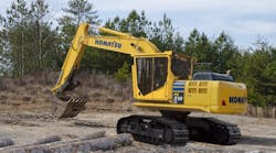 A Komatsu log loader at work. The company is creating a new forestry attachments division to grow that business.