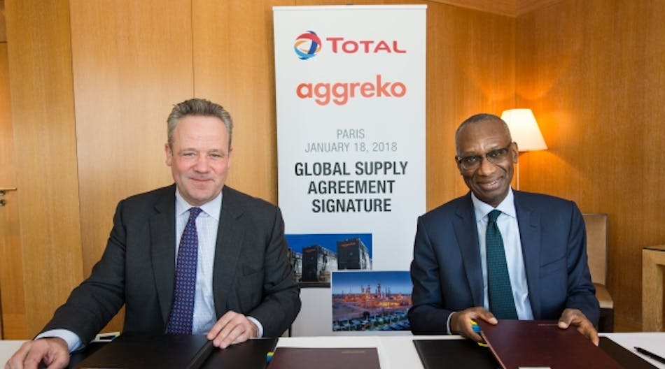 Aggreko CEO Chris Weston, left, and Total Marketing &amp; Services president Momar Nguer, sign a global supply agreement in Paris last month.
