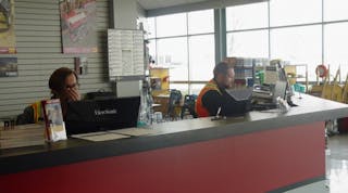 Staff at Battlefield Equipment Rental&apos;s rental counter in Brantford, Ontario, Canada.