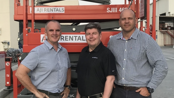 From left Dean Jones general manager AJI Heavy Equipment Rental David Hall of Skyjack and Hannes Van Graan technical manager AJI with one of their new SJIII 4626 DC electric scissor lifts