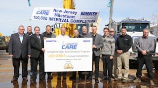 Komatsu CARE service team at J. Fletcher Creamer &amp; Sons in honor of 100,000 service intervals completed.