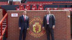 David Kohler president and CEO of Kohler Co left with Richard Arnold group managing director of Manchester United with the Manchester United logo