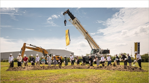 Liebherr staff and Newport News Va city officials start the ceremonial groundbreaking that will add 251000 square feet to the Liebherr US headquarters
