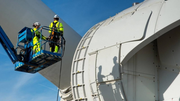 Technicians working on a wind turbine