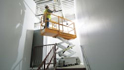 A Custom HyBrid lift at work in a stairwell A Custom HyBrid lift at work in a stairwell