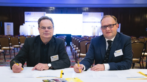 Haulotte CEO Tim Whiteman left and Stephane Hubert chief sales officer for Haulotte sign agreement at the Europa Hotel in Belfast making Haulotte a sustaining member of IPAF