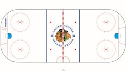 Komatsu39s logo on the ice at United Center for Chicago Blackhawk home games Komatsu39s logo on the ice at United Center for Chicago Blackhawk home games