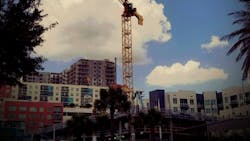 Sims tower cranes at work Sims tower cranes at work