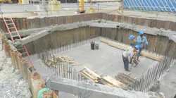 Workers in a trench protected by NTS shoring equipment