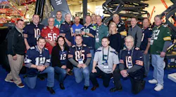 Despite apparently playing for a lot of different football and hockey clubs the Skyjack staff works together well enough to win an award as United Rentals Supplier of the Year for the second time