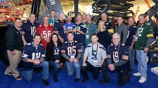 Despite apparently playing for a lot of different football and hockey clubs, the Skyjack staff works together well enough to win an award as United Rentals Supplier of the Year for the second time.