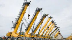 A row of Grove lift trucks await being sold at the massive Orlando auction site