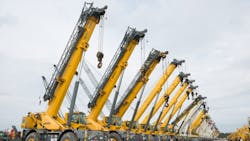 A row of Grove lift trucks await being sold at the massive Orlando auction site A row of Grove lift trucks await being sold at the massive Orlando auction site