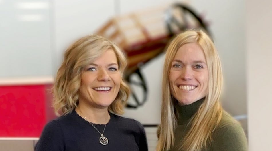 Bonnie Radjenovich, left, vice president of human resources and co-owner, and Brenda Jennissen, president and CEO of Felling Trailers, celebrate the company&apos;s designation as a Women&apos;s Business Enterprise.