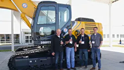 A Crano Excavating staff enjoys the celebration in Moore SC From left Raymond Riter treasurer Mike Jones superintendent Jim Riter president and Jimmy Riter estimator