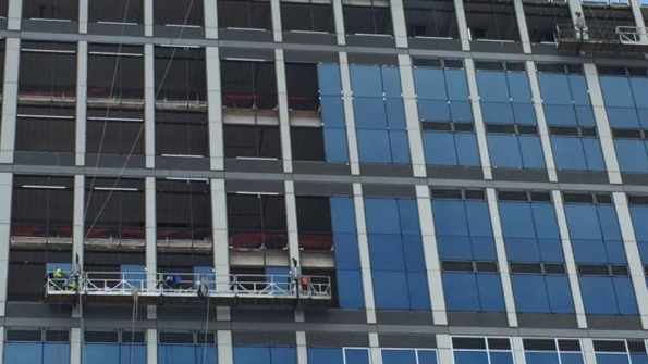 Spider Engineers Custom Solution for Window Wall Installation | Rental ...