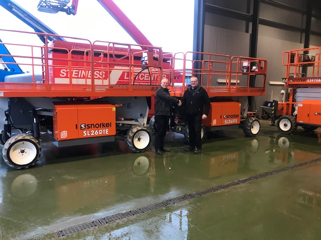 Snorkel Karsten Haahr Of Kh Lift Ap S Left Hands Over The Electric Speed Levels To Poul Steiness Right Of Steiness Liftcenter Ap S In Denmark 002 5e47145947bf2