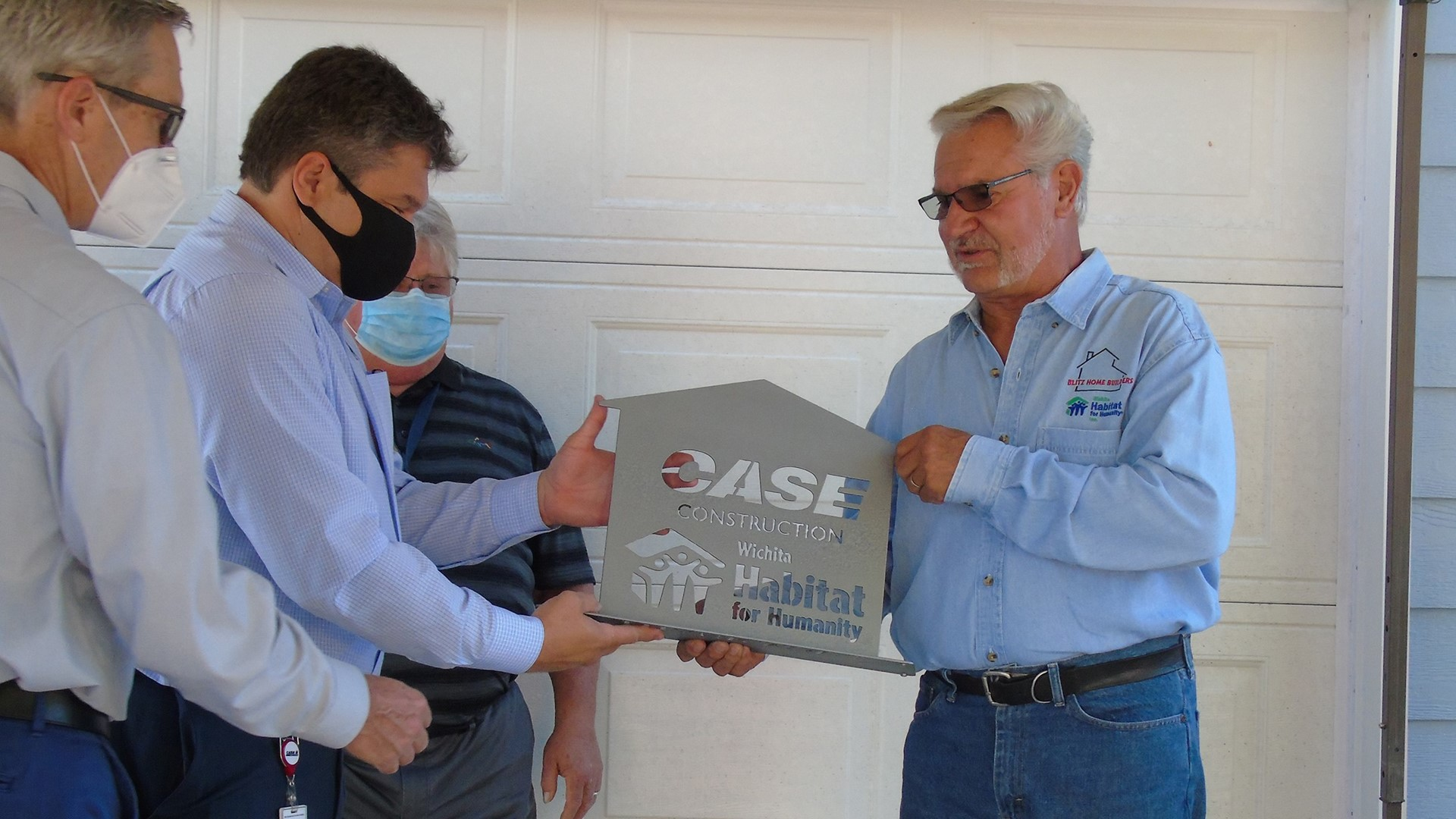 Case Presents To Habitat For Humanity 5f0e715524433