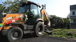 Case National Grid Crews Work With The Case 580 Ev