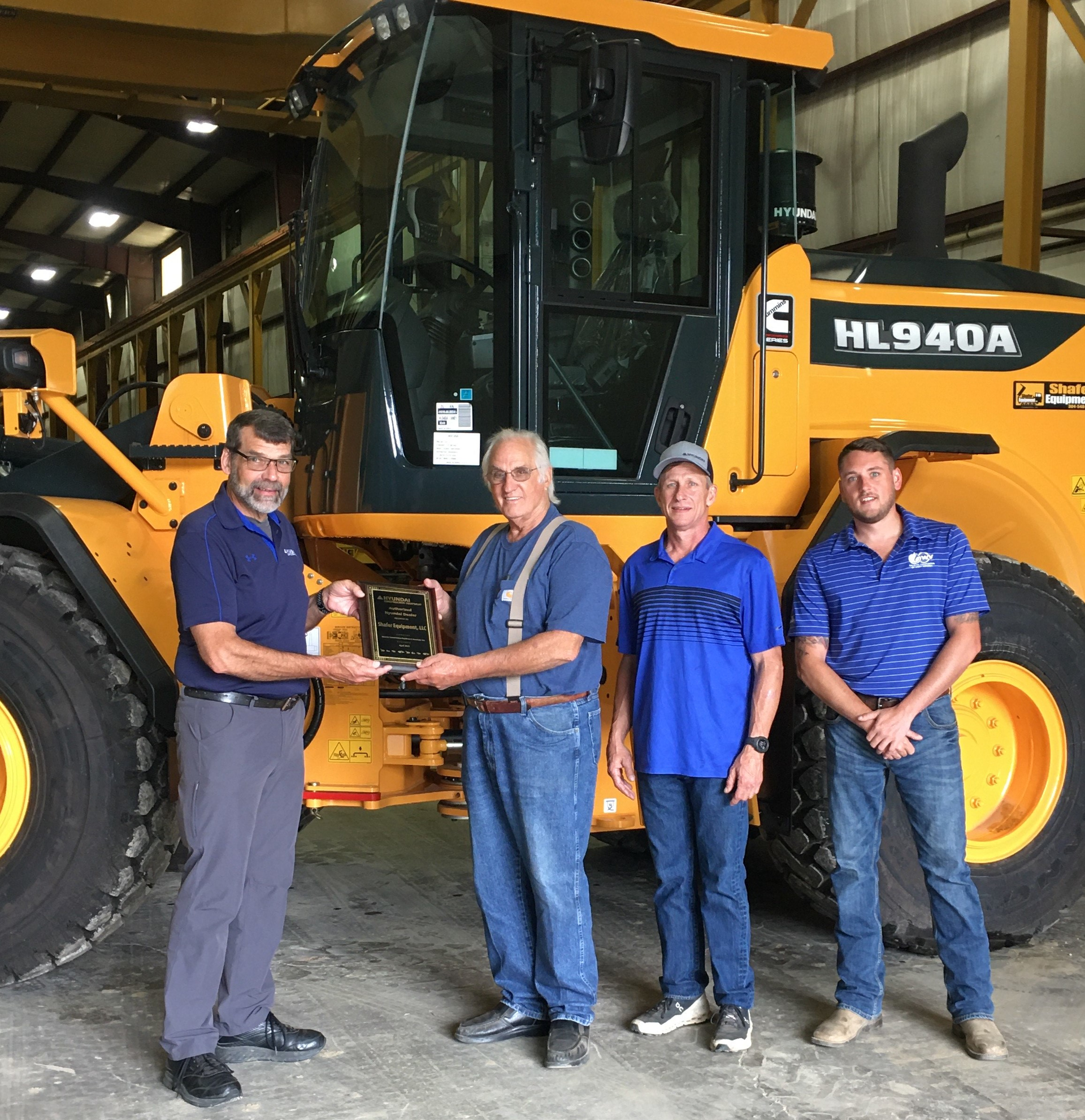 Bill Klein (left), Northeast Sales Manager For Hyundai Construction Equipment Americas, Presents Hyundai Dealer Plaque To Shafer Equipment Management Team (left To Right), Jim Shafer, Owner; Billy Evans, General Manager; And Aaron Cox, Sales Manager