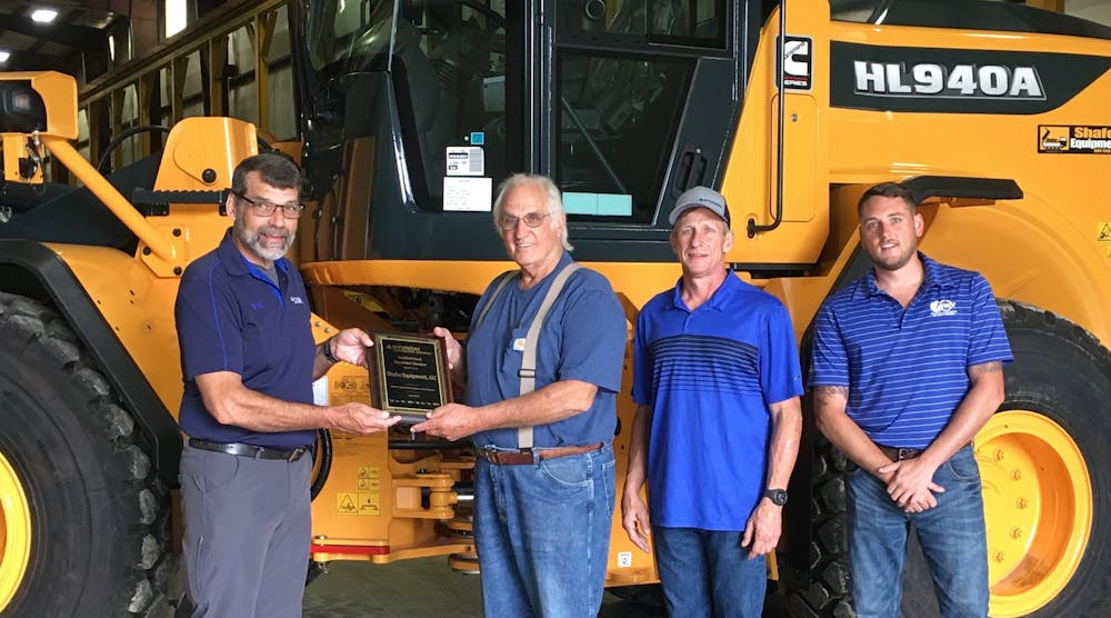 Bill Klein (left), Northeast sales manager for Hyundai Construction Equipment Americas, presents Hyundai dealer plaque to Shafer Equipment management team (left to right), Jim Shafer, owner; Billy Evans, general manager; and Aaron Cox, sales manager.
