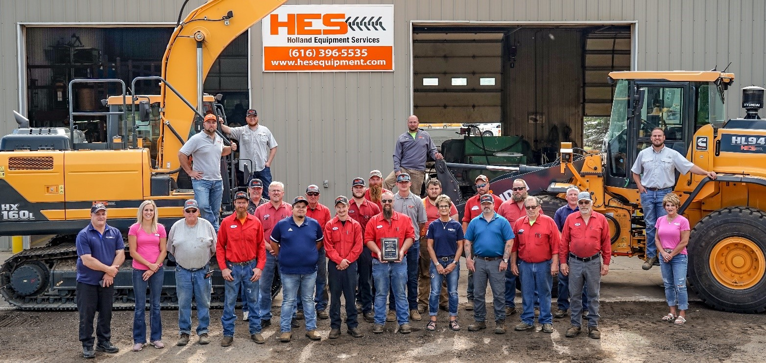 Hyundai Construction Equipment and Holland Equipment Services teams