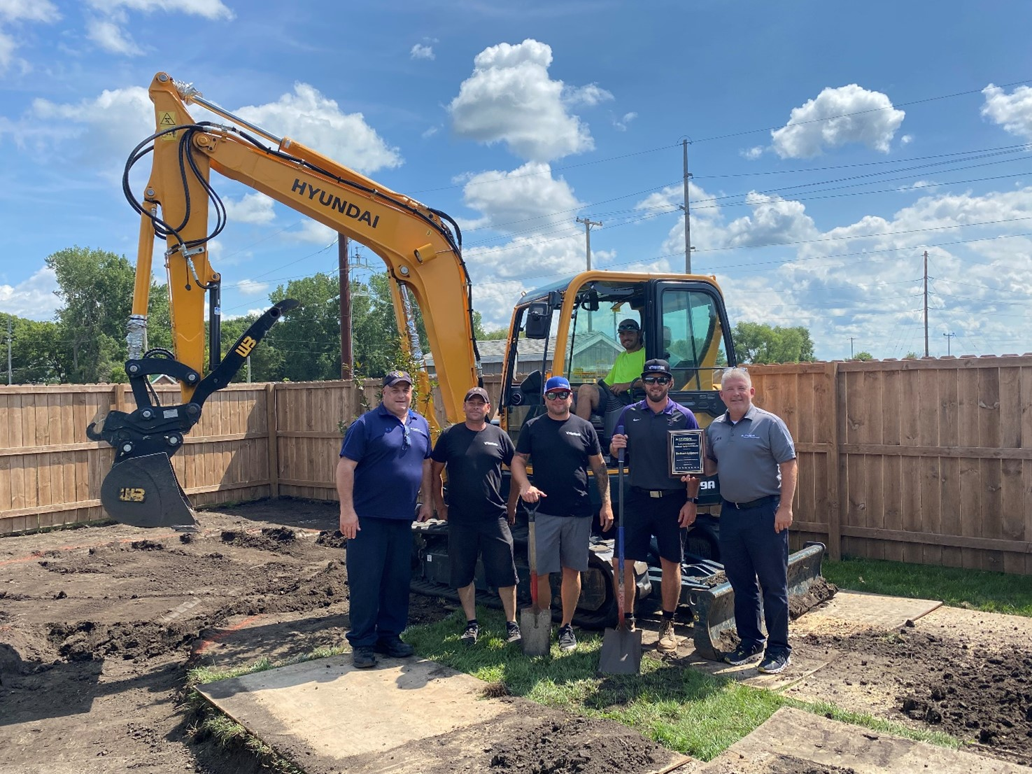Hyundai Has Expanded Its Network Of Dealers With The Addition Of Blackhawk Equipment In Lake Crystal, Minn, As A Hyundai Compact Excavator Dealer Ed Harseim (r), Hyundai Construction Equipment America&rsquo;s Midwest Sales Manager, And Jon Wise (l), Hyundai&rsquo;s Midwest Service Manager, Present The New Dealership Plaque To Tyler Deike, President Of Blackhawk Equipment, Along With Two Of His Team Members (l To R), Darwin Revland, Service Technician, And Aaron Cotton, General Manager The Hyundai Excavator, Operated By Landscaper Tyler Leibfried, Is Owned By Blackhawk&rsquo;s Sister Company, Thomas Tree & Landscape
