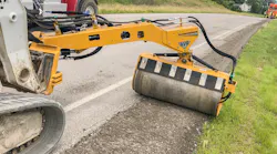 Road Widener offset vibratory roller spray bar system