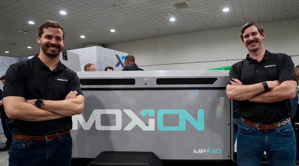 Moxion Paul Huelskamp, Ceo, And Alexander Meek, President In Front Of Mp 30 Unveiled At Con Expo (1)