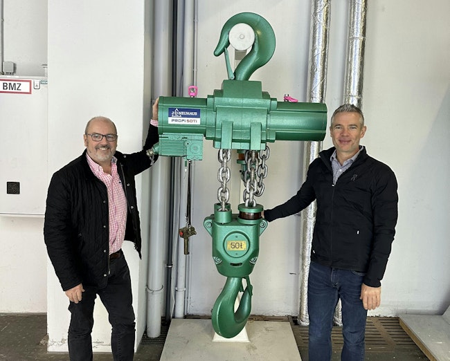 Operations director Phil Smith, left, and Andrew Mault, CEO of LGH Europe with a high-capacity air chain hoist from J.D. Neuhaus.